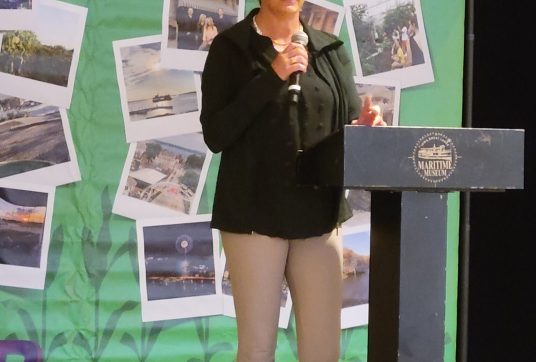 Carrie Koelker accepts the Joe Taylor Vision Award