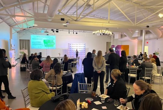 Iowa Tourism Night Attendees listening to remarks
